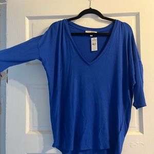 Blue express quarter length sleeve top. Size small brand new with tags